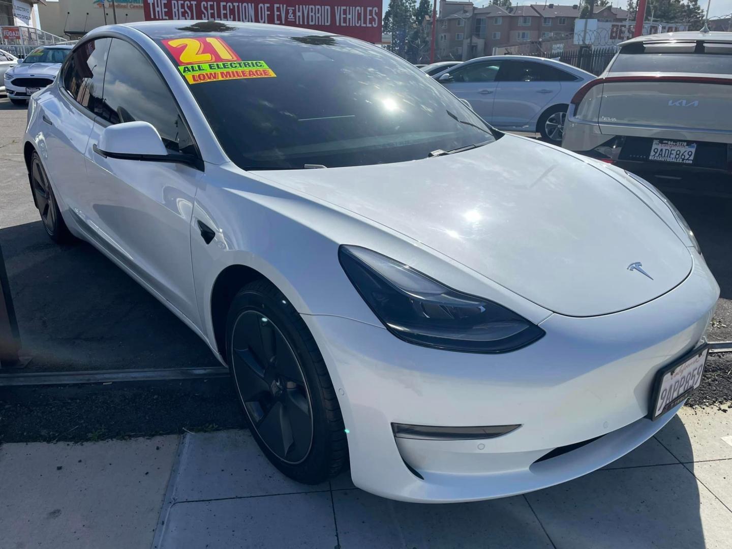 2021 WHITE /BLACK Tesla Model 3 Long Range (5YJ3E1EB8MF) with an ELECTRIC engine, 1A transmission, located at 744 E Miner Ave, Stockton, CA, 95202, (209) 944-5770, 37.956863, -121.282082 - PLUS TAXES AND FEES- Photo#0